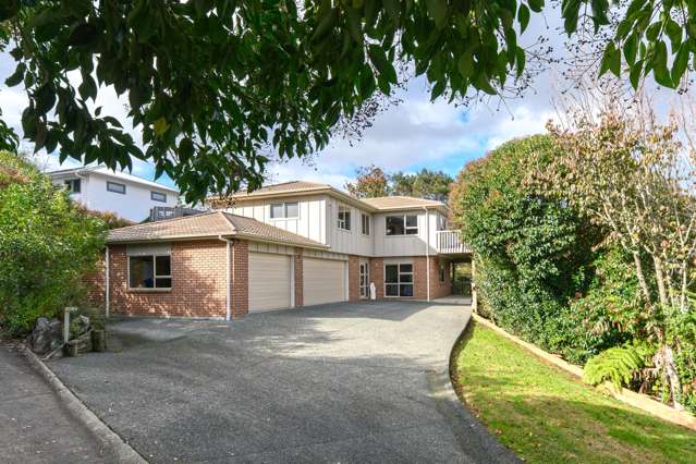 Three Car Garage with a Family Home!