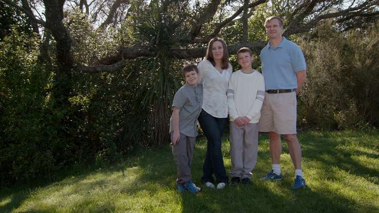 Andre and Bettie Collen and their sons Juandre and Kieran rattle through their list for host Jayne Kiely. Photo / Supplied