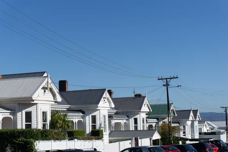 Kāinga Ora is selling two neighbouring homes on Ponsonby's Parawai Crescent. The homes, which back onto a reserve, have a combined RV of $4.33 million. Photo / Supplied