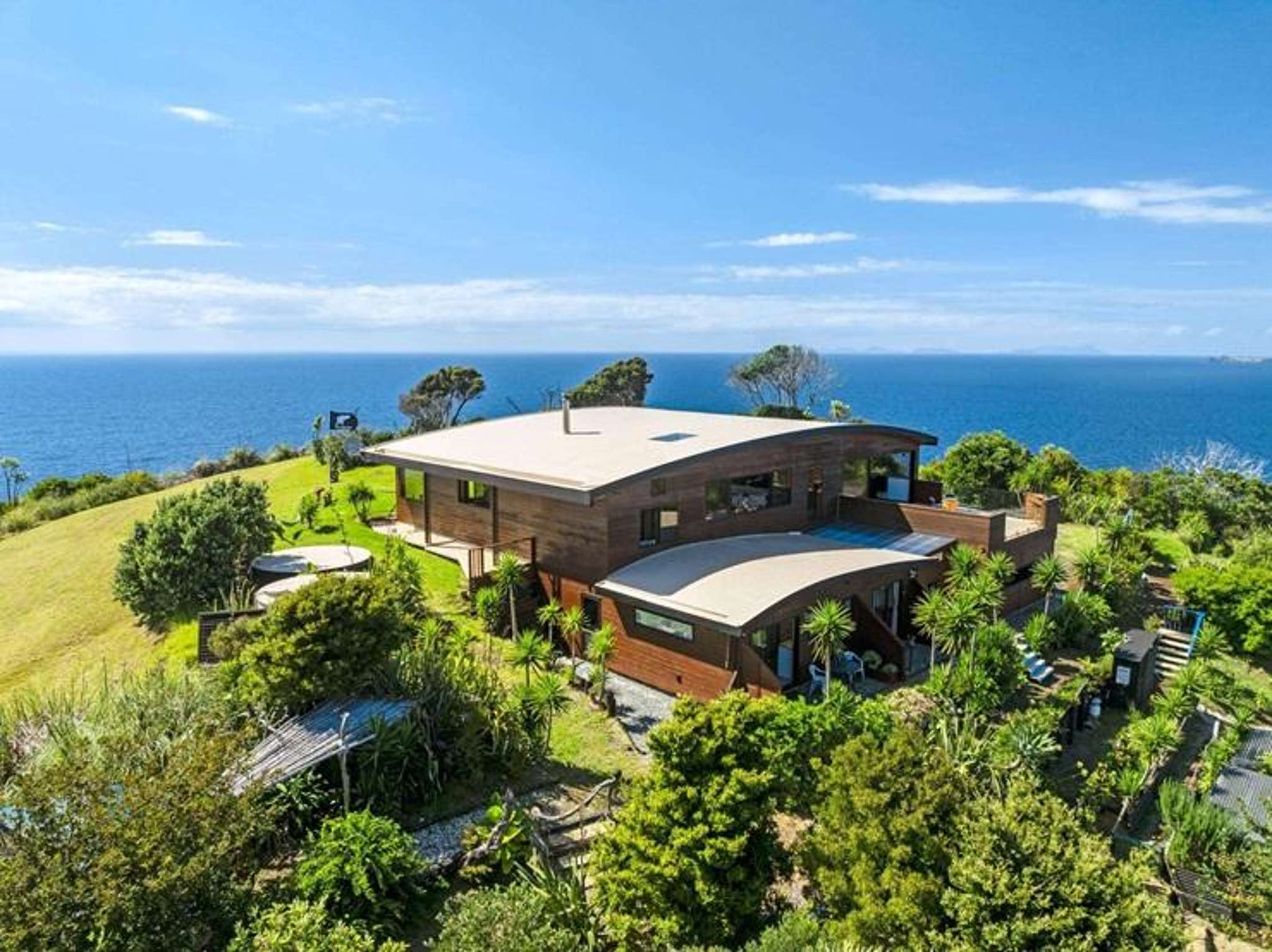 Music couple selling their party home - forget dancing on the ceiling, they skate on the roof