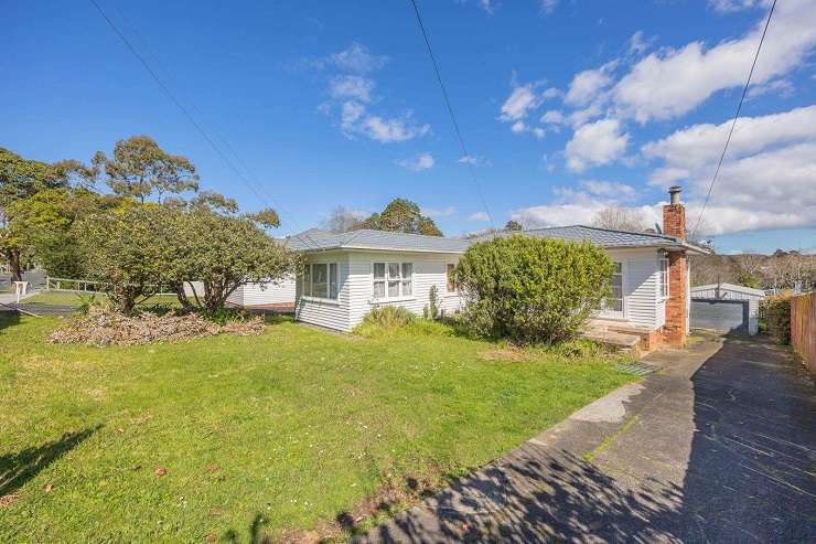 blue swimming pool in front of 1970s brick house 116 St Andrews Road,Epsom, AUckland