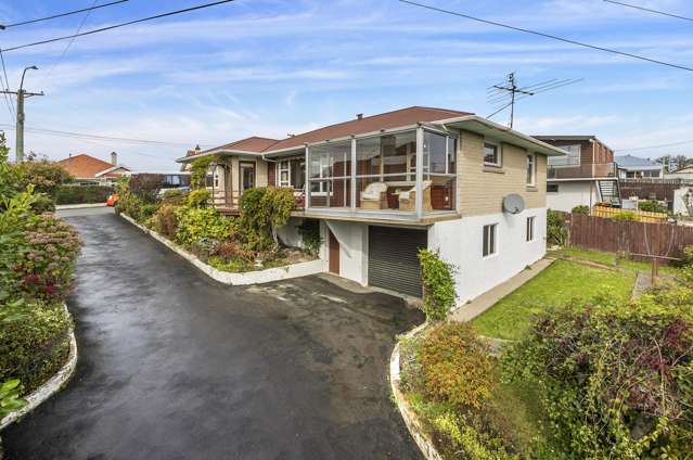 An ideal family home with extra large garaging!