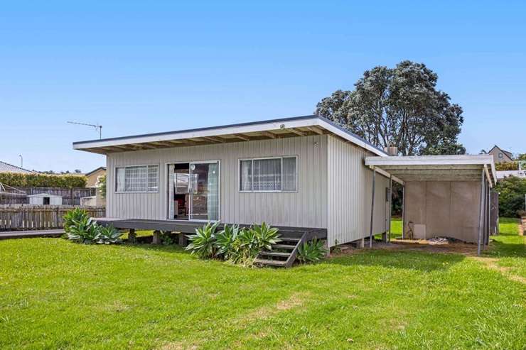 A two-bedroom leasehold bach at 9 Rockell Road, in Whananaki, Whangārei, has a $220,000 price tag. Photo / Supplied