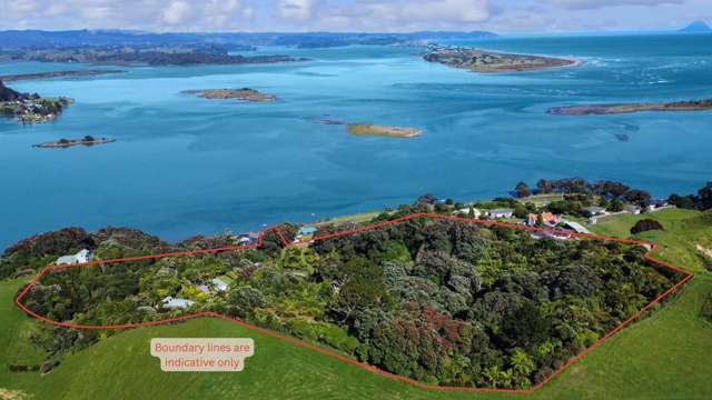 Elevated coastal retreat + harbour views
