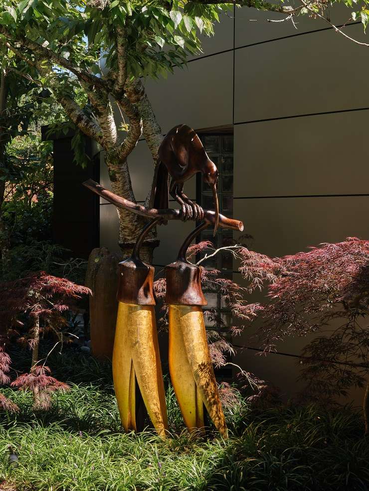 The Ron Sang house on Glenfell Place, in Epsom, Auckland, was sold under the hammer at an art and property auction today. Among the 200 artworks on the block was a bronze and yellow sculpture by Paul Dibble.  Photo / Supplied