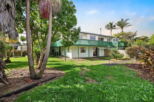 TLC needed 5-Bedroom Home with Great Potential!
