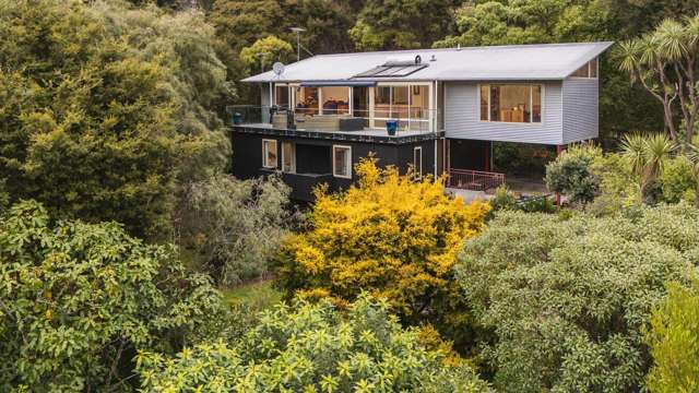 Superb, sheltered location, bush & harbour view.