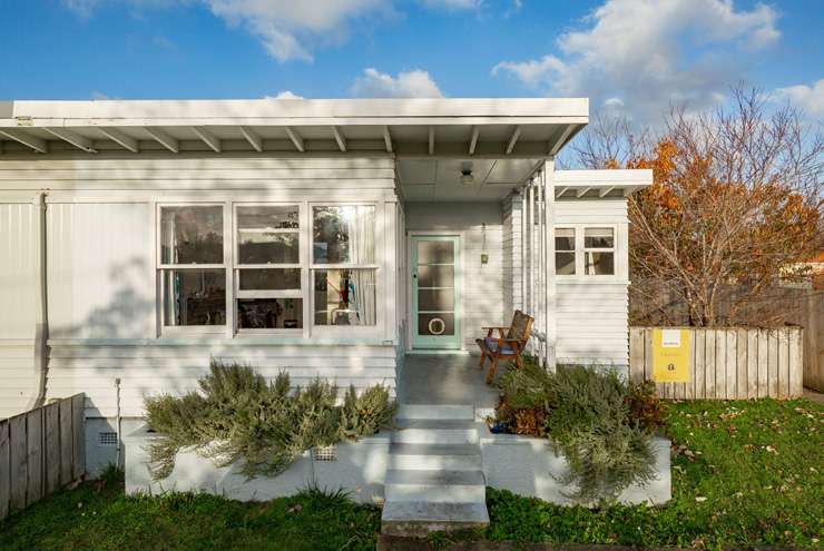 The two-bedroom cottage on Marshall Street, in Fairfield, Hamilton, was advertised as a do-up. Photo / Supplied