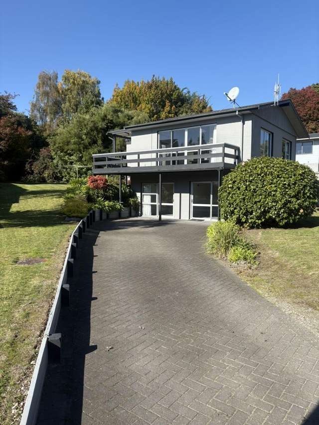 One-bedroom upstairs Living – Sunny, Spacious & Steps from the Lake