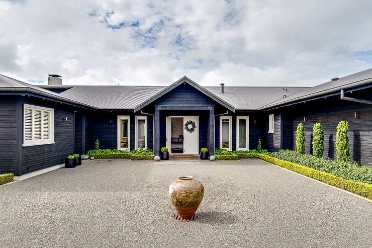 This luxury home on Paritai Drive, in Auckland's Orakei, sold off market for $20m this year. Photo / Supplied