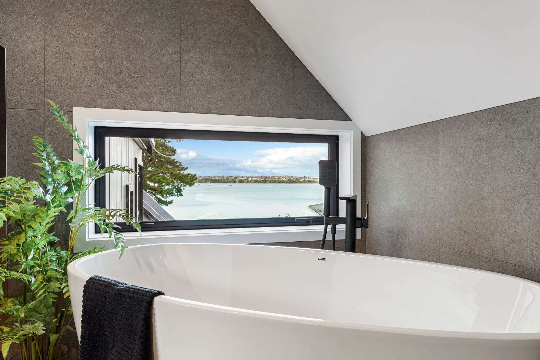 52A Silverton Avenue in Wai O Taiki Bay, Auckland has five bedrooms, two bathrooms and a double garage.