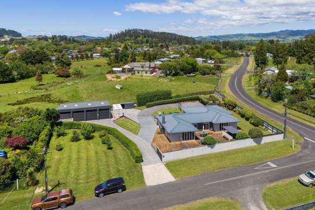 Stylish Home with Four-Bay Shed