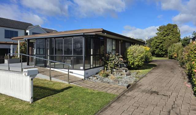 Waterfront Living with Mount Views Three Bedrooms Plus a Versatile Fourth Room