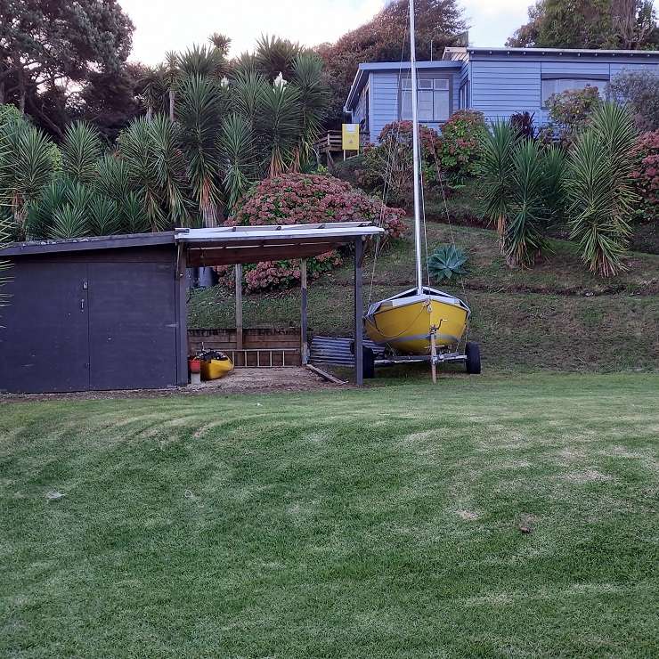 The two-bedroom, two-bathroom holiday home at 123 Okapu Place, in Aotea, has been described as the best home for many miles. Photo / Supplied