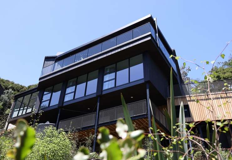 One of the listing photos from the Waiheke Island home that appeared on Grand Designs New Zealand. The house was incomplete at the time, so the listing used renders. Photo / Supplied