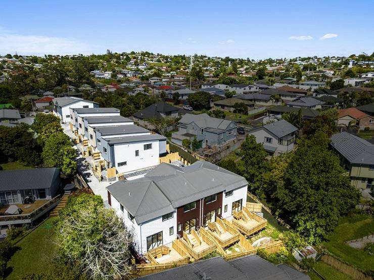 Twenty-two homes in a 60-house development on McLeod Road, in Te Atatu South, Auckland, are being sold in bulk. Photo / Supplied