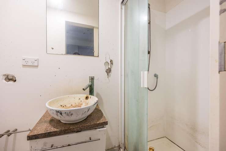 This one-bedroom apartment at 5B/113 Vincent Street, in Auckland CBD, has holes in the wall