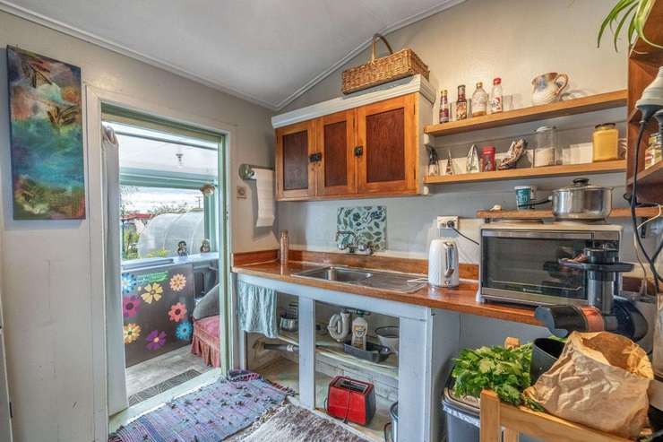 A two-bedroom home for sale at 11 High Street East, in Nightcaps, Southland, is seeking offers over <img59,000. Photo / Supplied