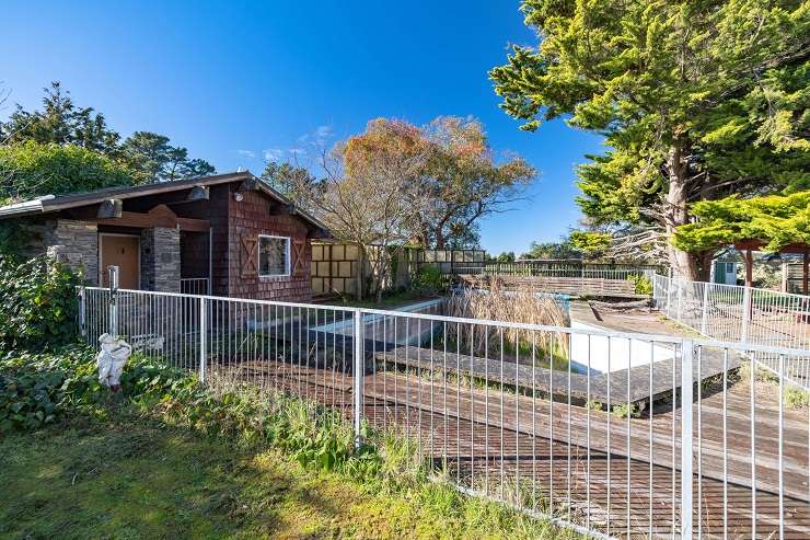 The abandoned house bordering Waimairi Beach Golf Course was snapped up by a couple at auction last week. Photo / Supplied