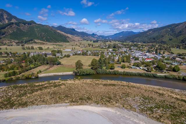 Two dwellings on flat land, on the edge of town