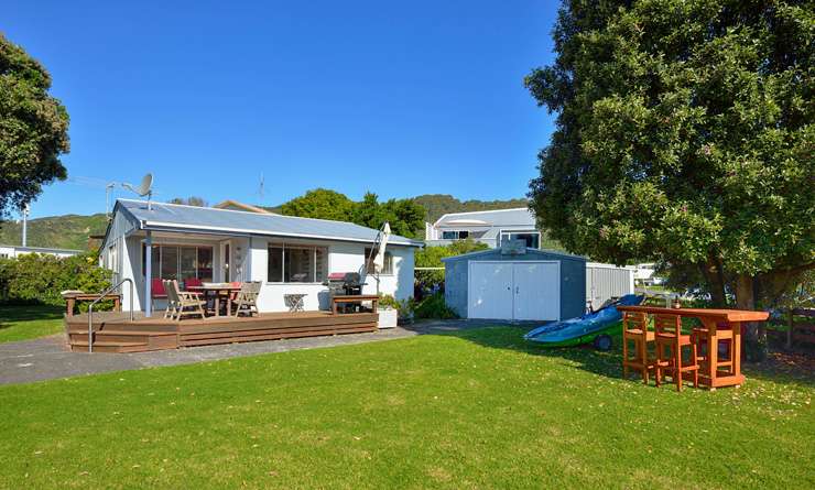 A three-bedroom brick home on Potae Avenue, in Lytton West, Gisborne, proved popular in the auction room. Photo / Supplied