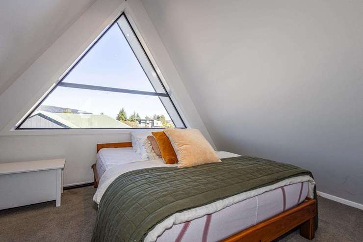 A three-bedroom A-frame chalet is up for grabs at 21 Findlay Street, in National Park, Ruapehu. Photo / Supplied
