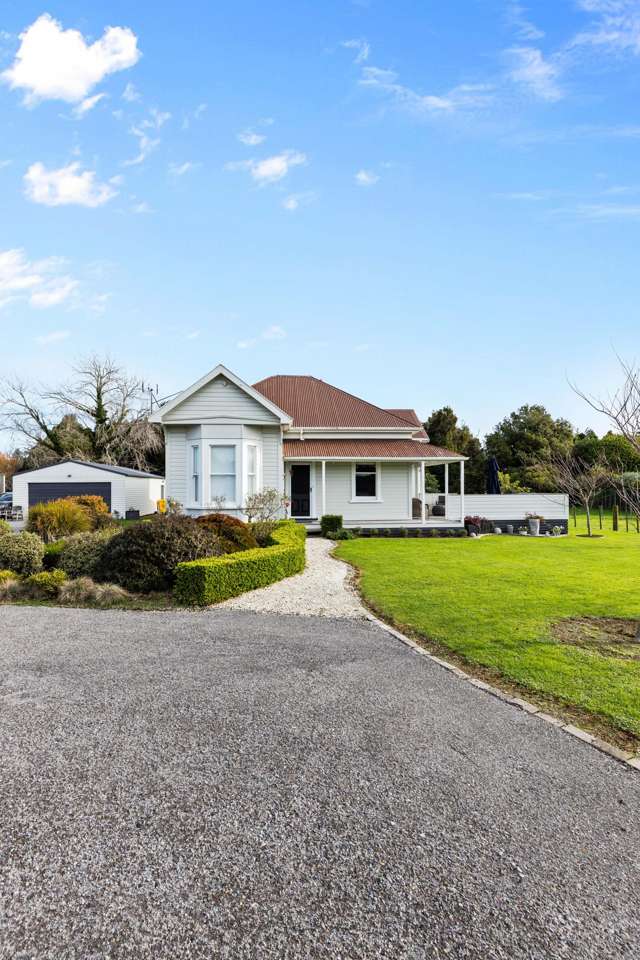 Character, 4.9 Acres & Serious Shed Space