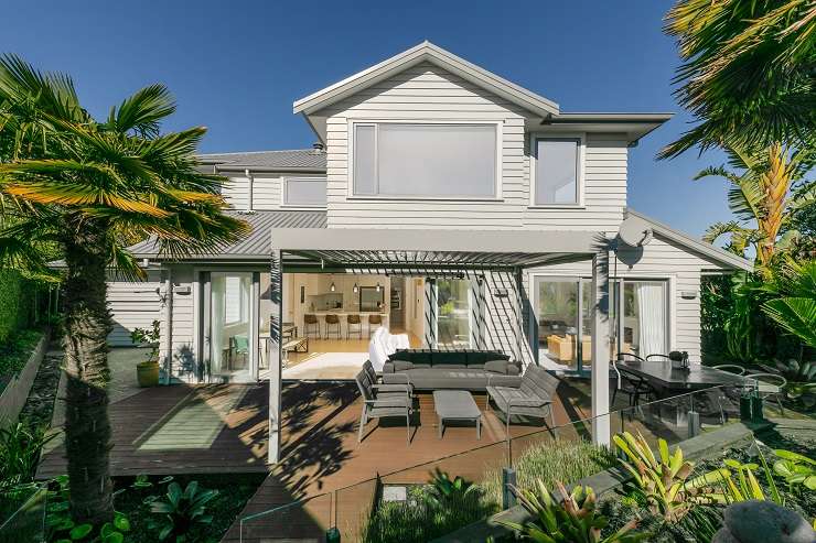 Tim and Arthur winners of The Block NZ 2021 in front of their Huia Street, Point Chev townhouse