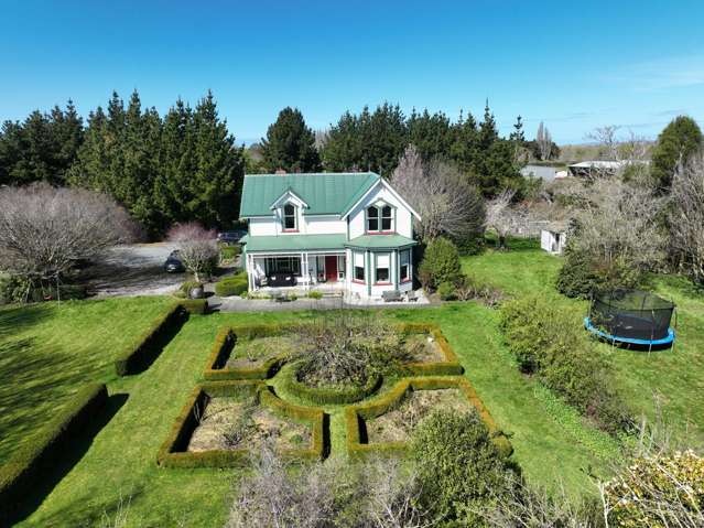 Charming Victorian Style Home and Quality Land