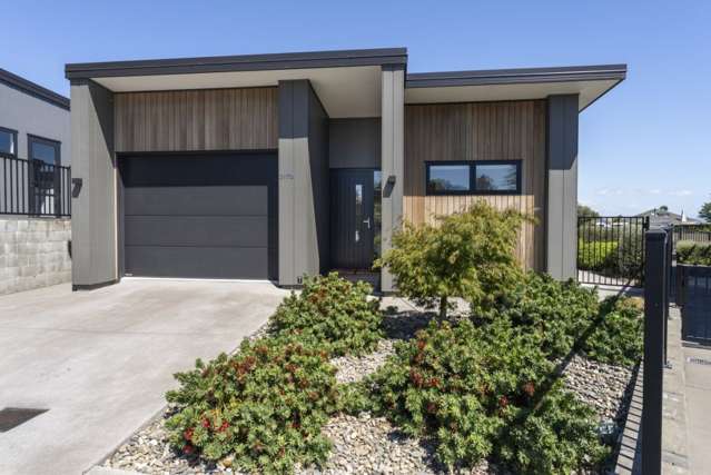 Near New with Impressive Features and Views!