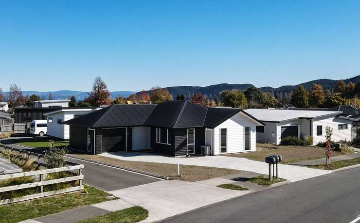 Kinloch on Lake taupo with flax, jetty boats is home to some of the most breath-taking views New Zealand has to offer