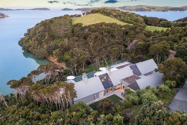 white pavilion house with glass roof and infinity pool  729 Orapiu Road, Omaru Bay, Waiheke Island Auckland