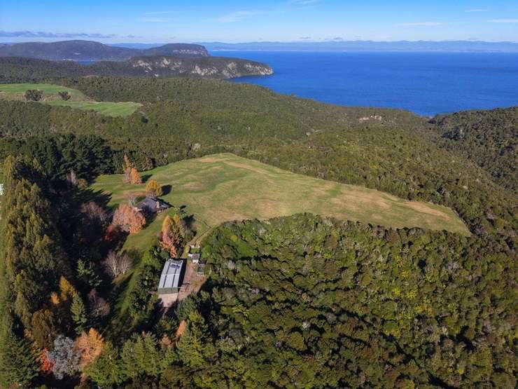 The two-bedroom log cabin for sale at 1679 Whangamata Road, in Marotiri, Taupō, is fully off-grid. Photo / Supplied