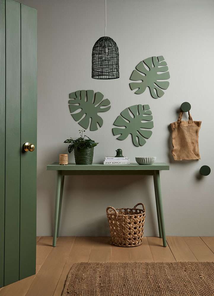 Frame drops of wallpaper for an eye-catching and unique feature wall. Side wall in Resene Blanc, rear wall in Woodland, floor and side wall in Blanc. Project by Vanessa Nouwens. Photo / Bryce Carleton.