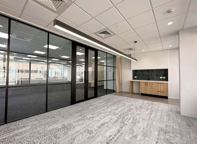 TOP FLOOR WITH NEW FITOUT AND 12 PARKS