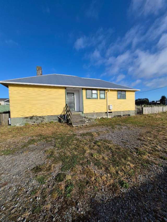 Private 3 - Bedroom Home with Fenced Backyard & Off-Street Parking