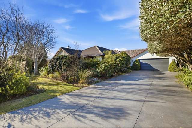 Solid Brick Beauty with Garage to Envy!