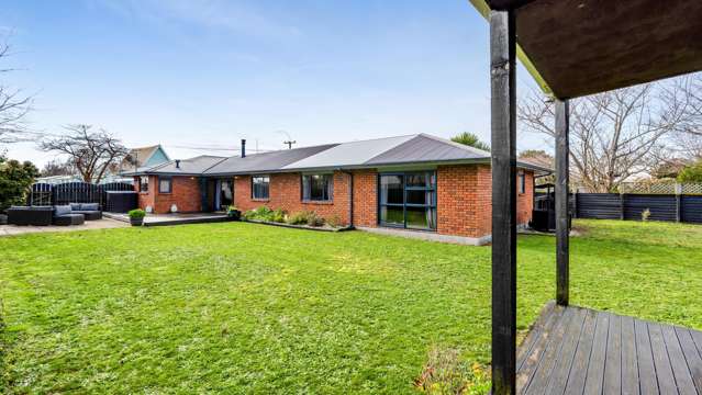 Five-bedroom, two-bathroom brick home