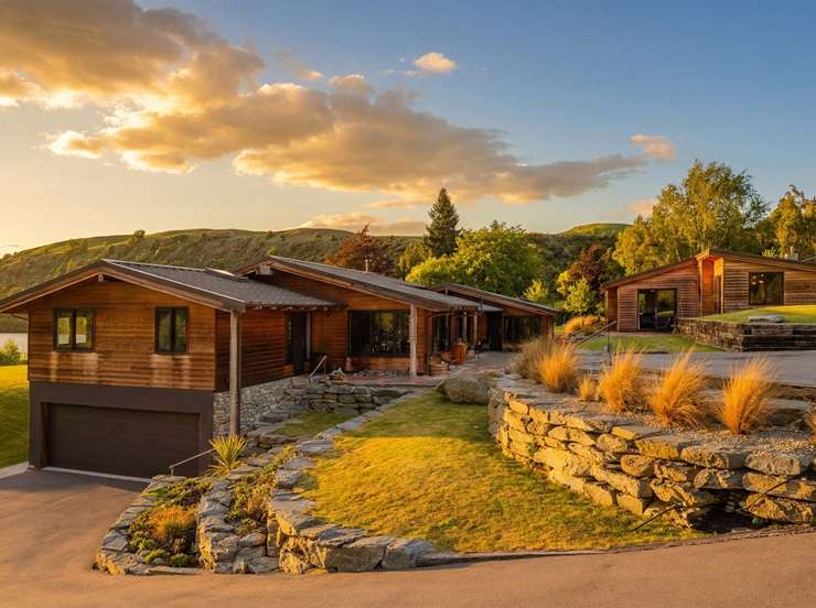 A picturesque five-bedroom designer home at 4 Fishermans Lane, in Mount Creighton, Queenstown, is up for grabs for $9.625m. Photo / Supplied