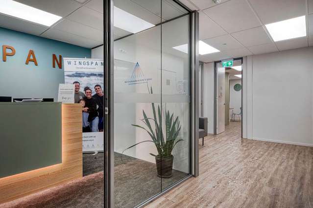 ELEVATED, REFURBISHED OFFICE WITH NINE PARKS