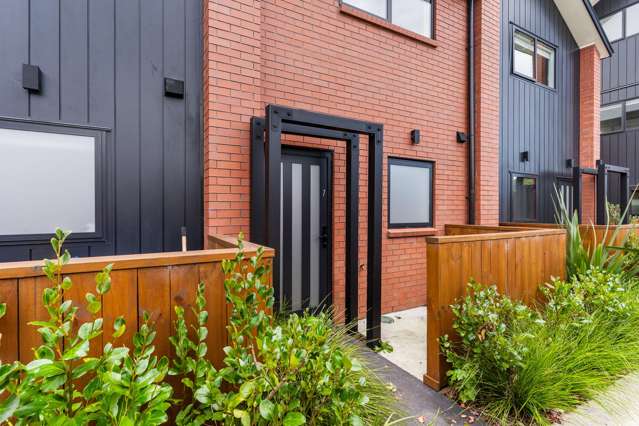 Modern Brick Home with Charming Backyard
