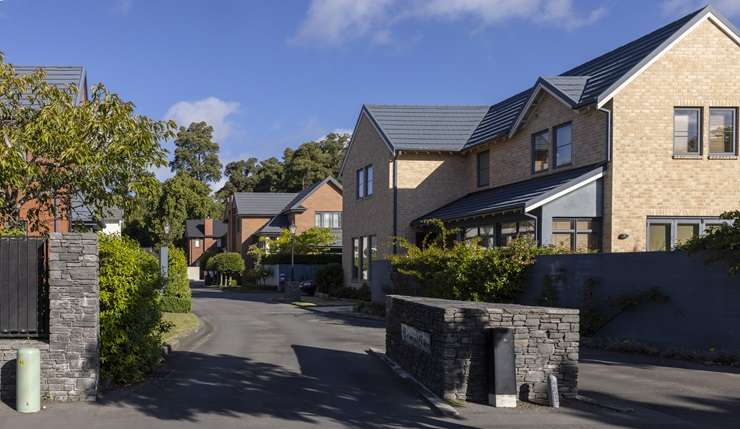 A buyer inspects homes for sale in Christchurch. House prices in the city are nearing their post-Covid peak, just $4000 below the June 2022 high. Photo / Peter Meecham