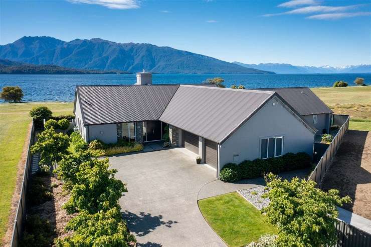 This luxury home on Paritai Drive, in Auckland's Orakei, sold off market for $20m this year. Photo / Supplied