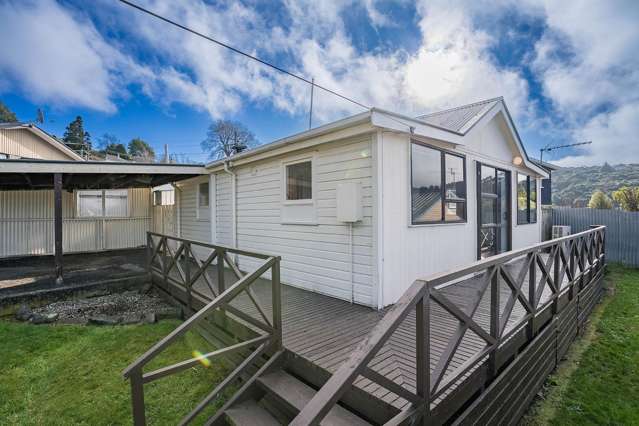 A tidy two-bedroom home with scope