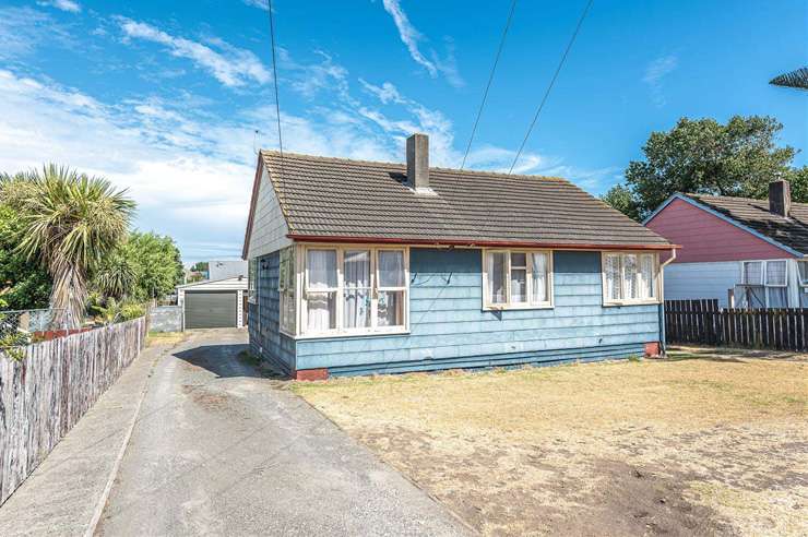 brick house with car parked in front  2 and 3/25 Simkin Avenue, St Johns, Auckland