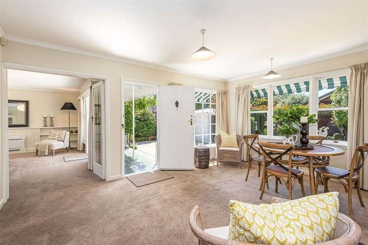 A 1950s classic brick house on Wai-iti Terrace, in Fendalton, saw more people through its first weekend of open homes than most houses see during an entire auction campaign. Photo / Supplied