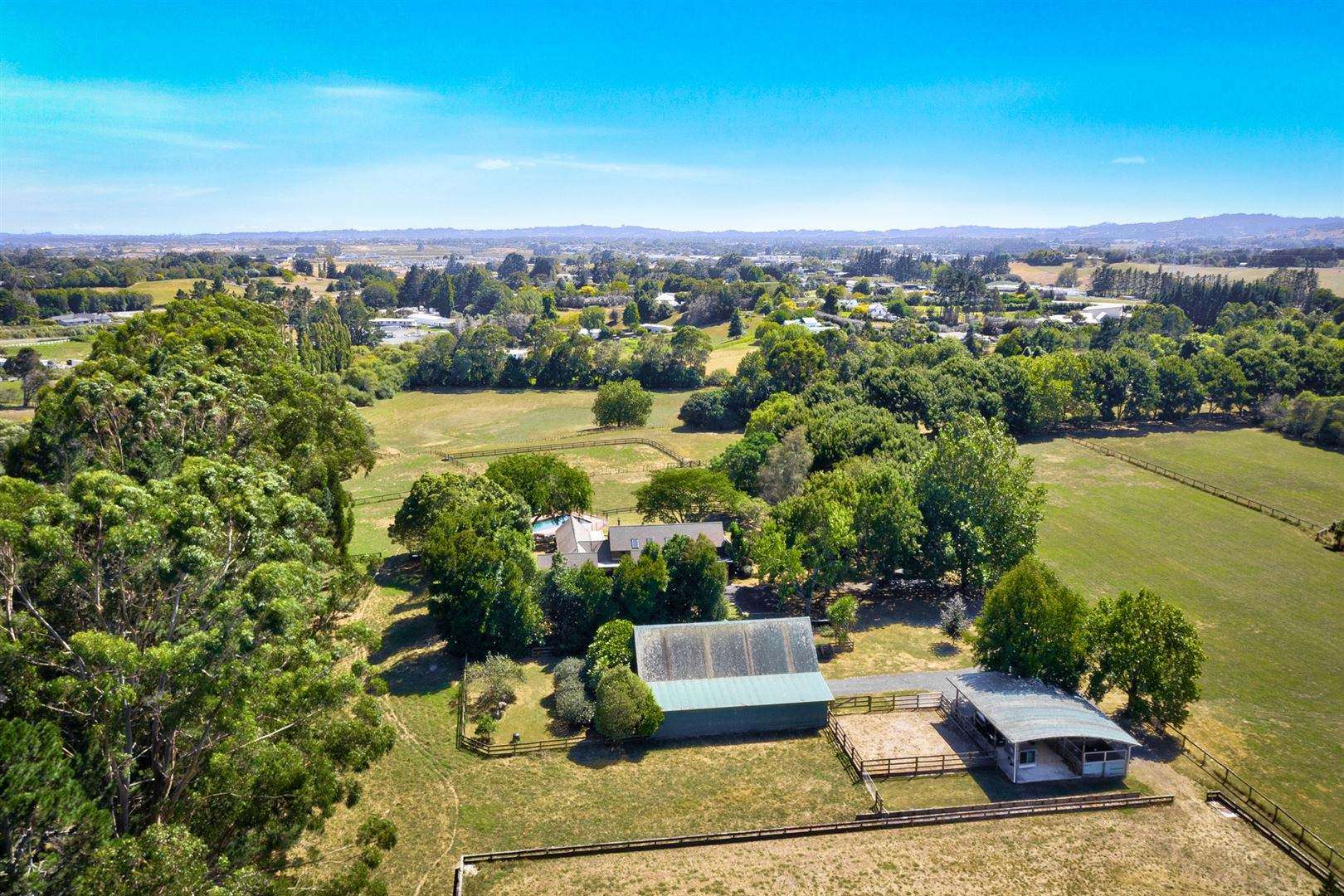 aerial view of suburban street with architect plan superimposed  50 Mountain View Road Morningside Auckland