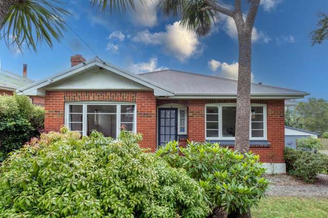 Sun-soaked Home With Great Garaging!
