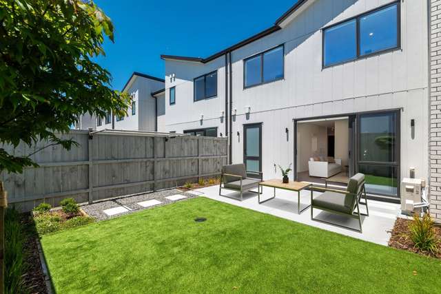 Modern Midâ€'Terrace Home with Double Carport