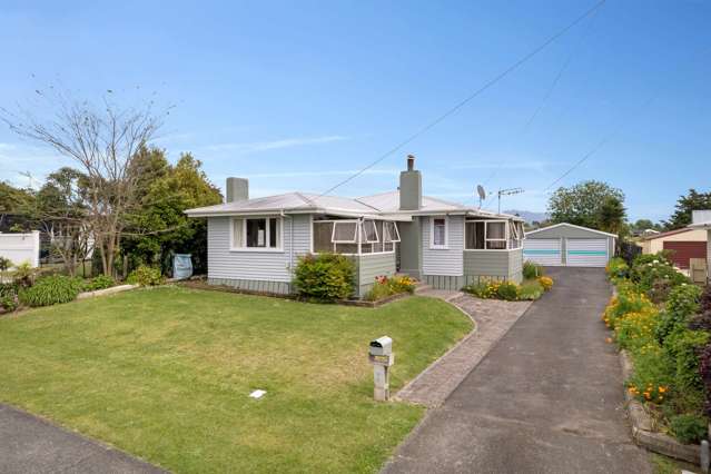 Mid-Century Family Charm with a Man Cave!